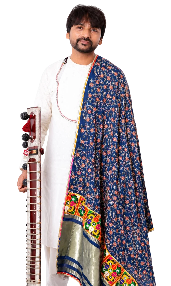 Jaydev Gosai holding a string instrument